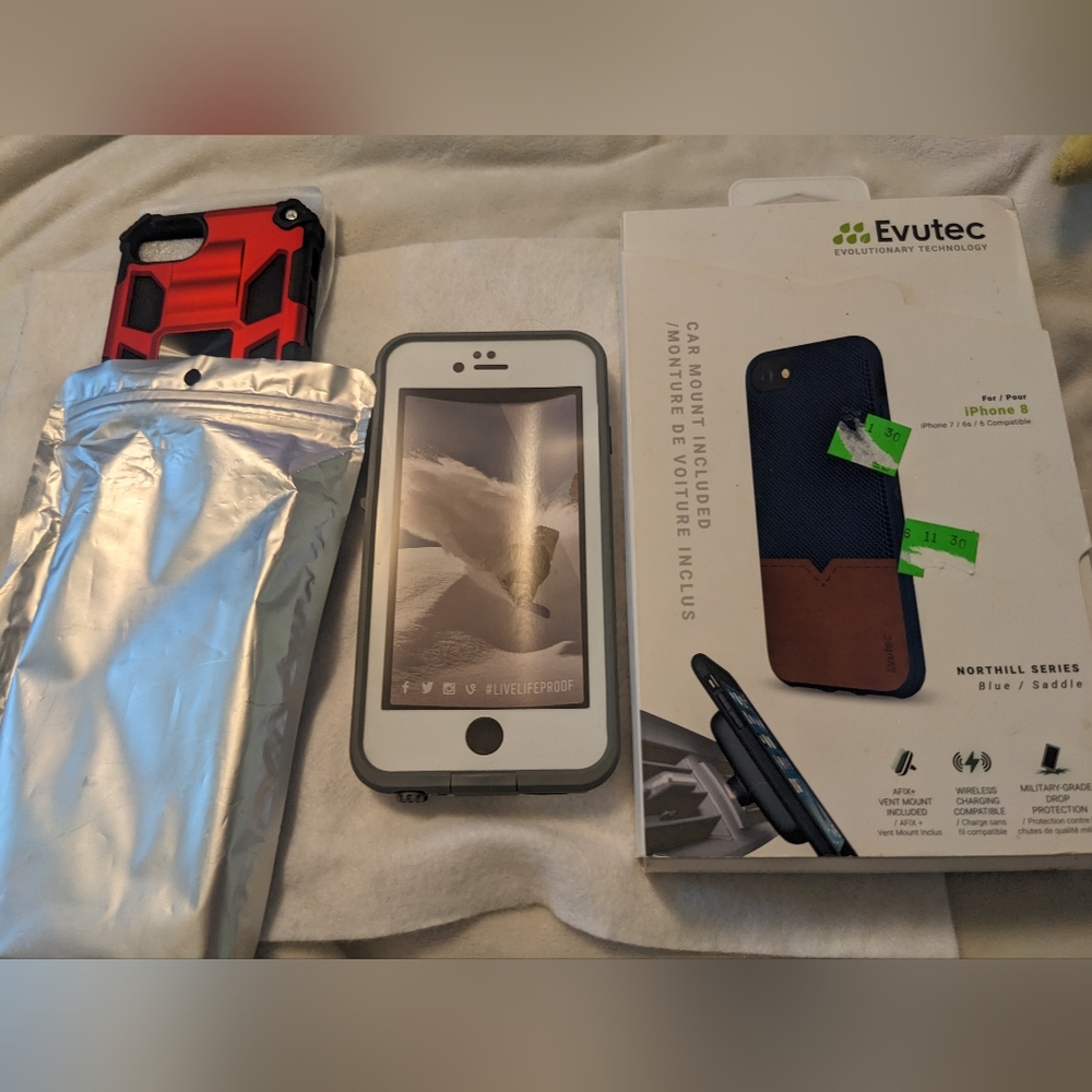 3 iPhone 8 cases and one screen protector. New in box.